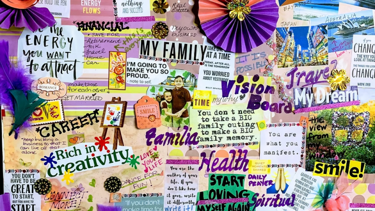 Photo of a vision board featuring cut out words and images by artist Erica Soto.